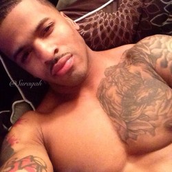 dominicanblackboy:  Sexy gorgeous tatted muscle hunk Suraqah!😍   Mmmm yes sir