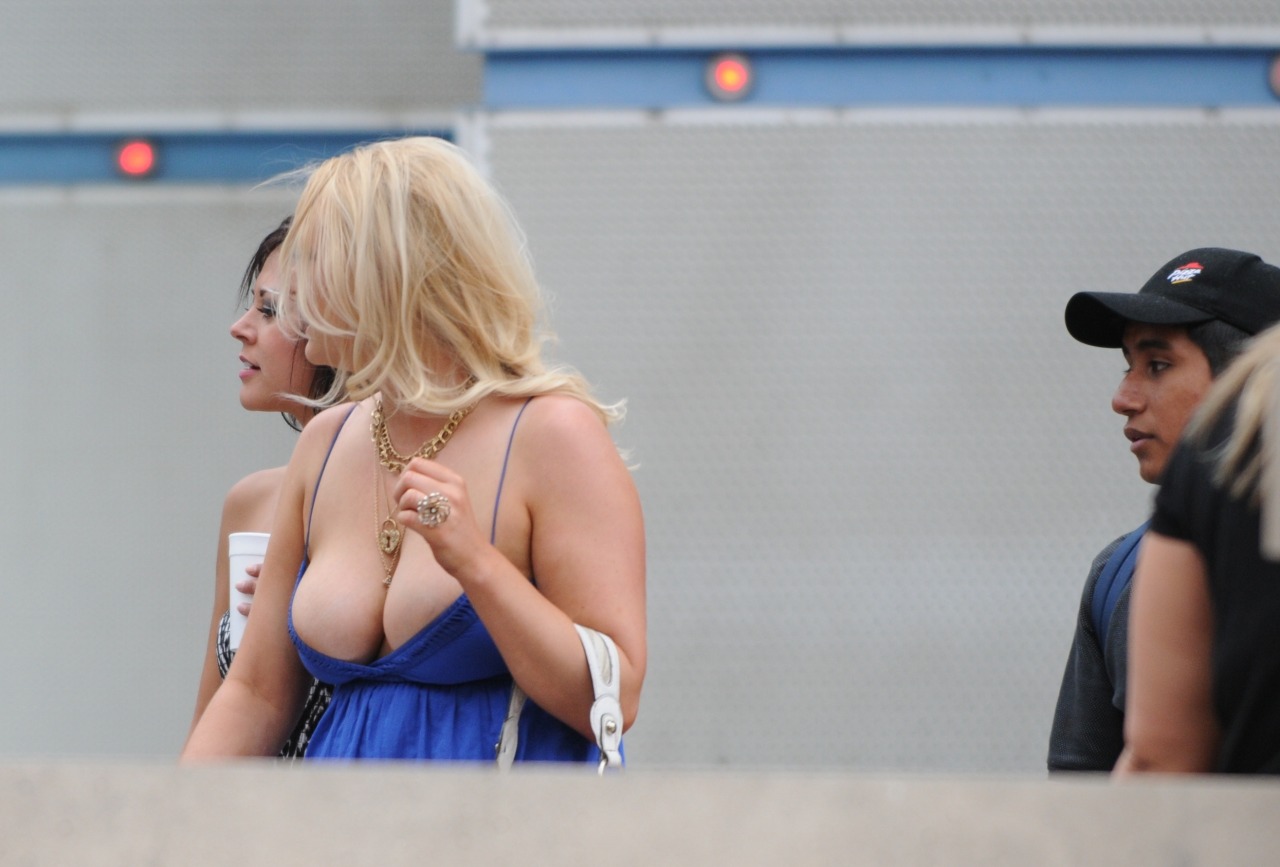 She is asking alot of that dress keeping those babies in there.