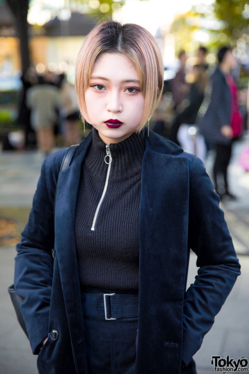 Japanese student Juri on the street in Harajuku wearing a dark look featuring a velvet blazer over a