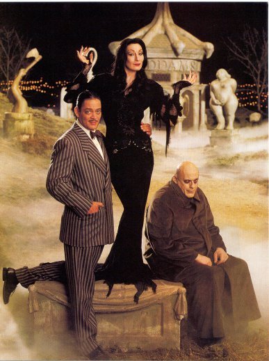 a-daughter-of-the-night:  guywoodhouse:  The Addams Family 1991  Literally just died, Morticia and Gomez look perfect in this. *sobs* Sorry but Fester just looks awkward in this. :3  