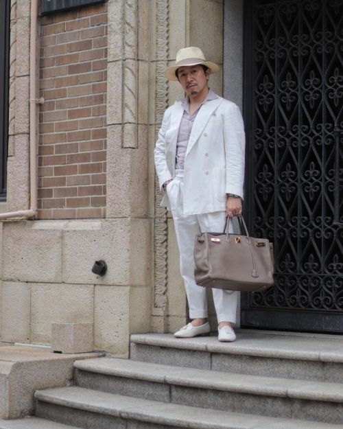 Styling in a white cotton suit…” ———————&mdas