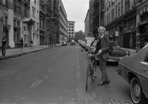 A rare photo of Andy Warhol getting ready to ride his bike down 11th Avenue in #NYC