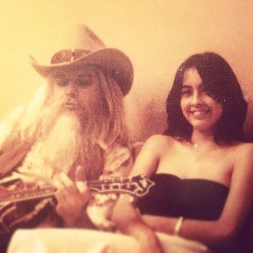 Leon Russell and cool lady circa late 70s / early 80s, by the look of his beard and hair colour
