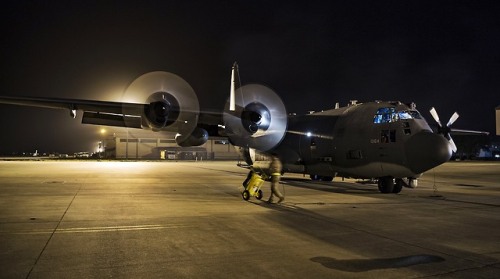 AC-130U Spooky and CV-22 Osprey A U.S. Air Force AC-130U Spooky Gunship from the 4th Special Operat