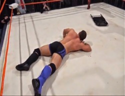 pickyofaceup:  Tristan Archer, KO’d flat on the mat…as usual  Best place for a jobber. And he makes such a great jobber. 
