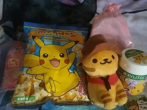 IM YELLING AND LAUGHING, so so @synnesai got a head start on xmas presents this year and literally sent mine in October (i love her) so the pokemon   japanese candy was like a side gift, SHE GOT ME A BILLY THE KITTEN PLUSH IMMMMM cowboy nya, she knows