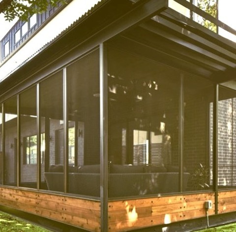 Contemporary PorchImage Of A Back Porch With A Roof Extension In A Medium-sized, Trendy Concrete Paver,