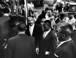life:   Martin Luther King Jr. encourages freedom riders as they board a bus for Jackson, Miss. in 1961. The civil rights activist would have been 85 today.  (Photo: Paul Schutzer—Time &amp; Life Pictures/Getty Images)  