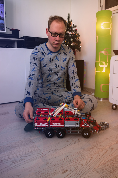 Lil boy is playing with his firetruck :-)