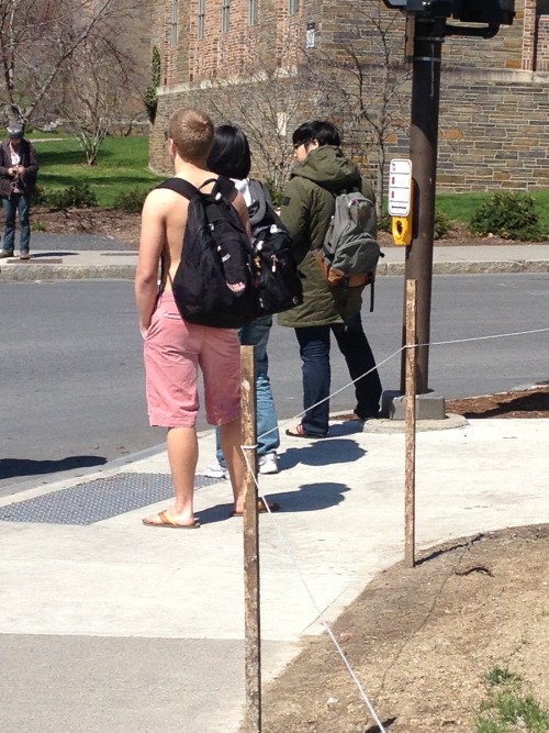 whiteboysinsalmonshorts:Extra points for no shirt and person in parka next to him? Seen at Cornell U