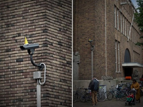 sketchlock:  unicorn-meat-is-too-mainstream:  DECORATING SURVEILLANCE CAMERAS WITH PARTY HATS TO CELEBRATE GEORGE ORWELL’S BIRTHDAY  OH MY GOD. 