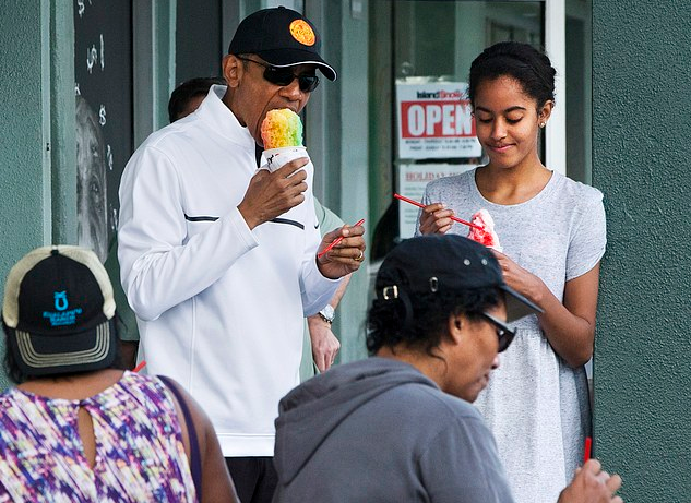 soph-okonedo:  U.S. President Barack Obama and daughter Malia Obama at Island Snow