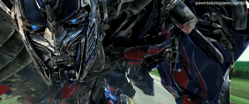 justyouraveragehaggis:  technohumanlation:   mycroft-brother-mine:  Optimus Prime was one bad-ass pissed off mofo, in AoE  I swear this is animation porn. Look at all the plating shifting, puffing out, sliding and folding and- the gears in his knee, his