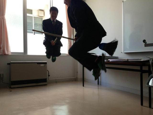  Japanese teens taking photos in which they appear to be flying on broomsticks to