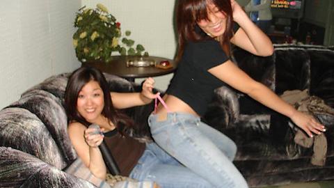 Cutie Tugs on her Friend’s Pink G-String