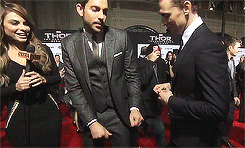 tomhazeldine:  Zachary Levi and Tom Hiddleston having a dance off on the red carpet