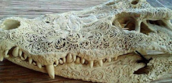 sixpenceee:  Intricate Crocodile Skull Carving 