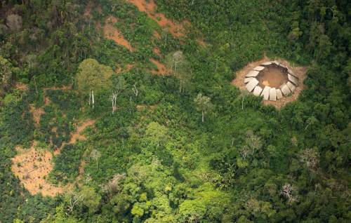 A shabono, or settlement of the Yanomami Indians in the middle of the Amazon rainforest, Venezuela.