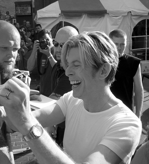 davidbowieobsession: David Bowie signing Autographs through out the years.. 