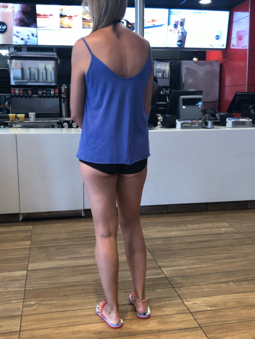 Waiting in line… do you like my mini shorts?
