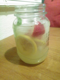 I Made A Whiskey Punch To End The Day With. Whiskey, Lemonade, Lemon Slices, Strawberry