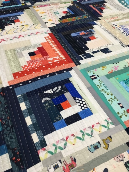 Log cabin quilting: This week, I finished quilting my log cabin scrap quilt. I decided on straight l