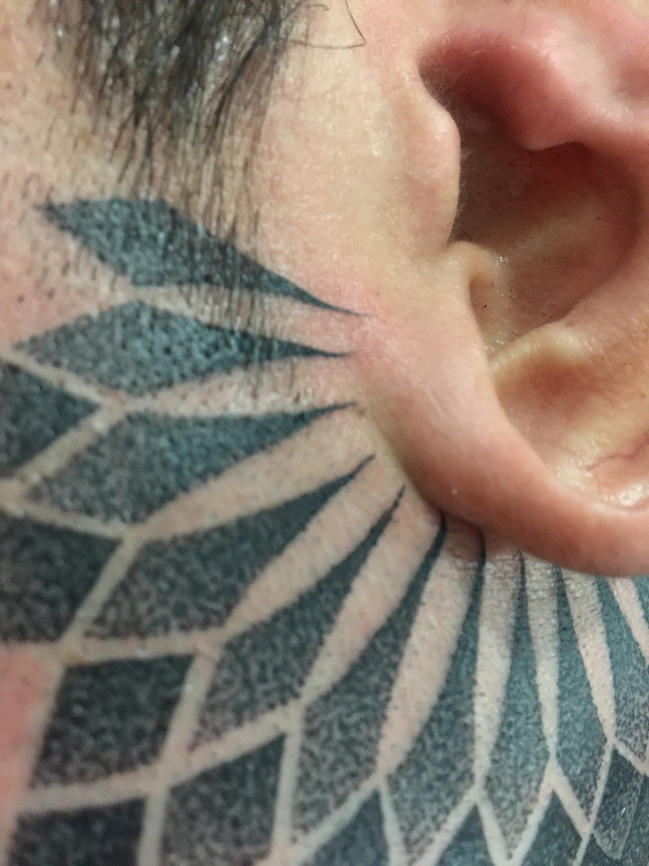 30 Cool Face Tattoos for Men  Meaning  The Trend Spotter