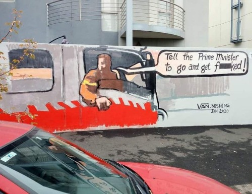 Mural in Melboune of heroic volunteer firefigher Paul Parker telling Prime Minister Scott Morrison t