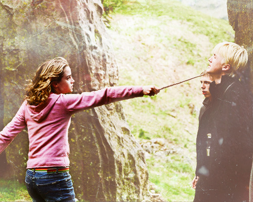 ewatsondaily:“Hermione!” said Ron weakly, and he tried to grab her hand as she swung it 