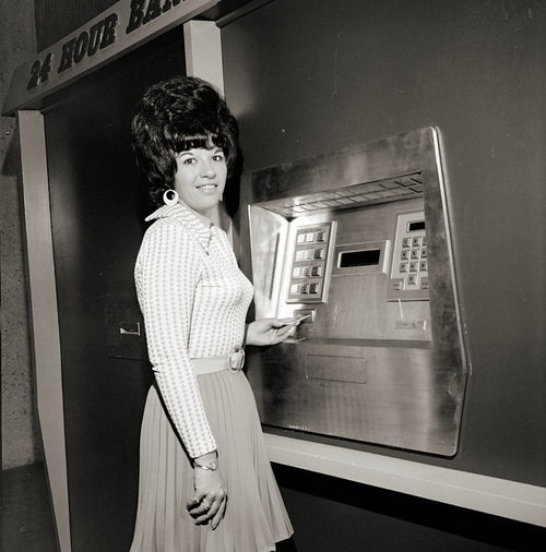 zestyblog:The first ATM.When big hair casually fleeced the ex’s checking account
