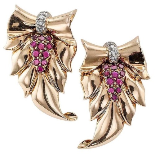 Retro era 1940s Acanthus Leaf Clip Brooches featuring rubies and diamonds set in gold by American je