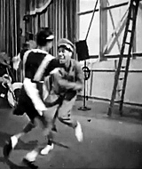 theladybadass:  Frances “Mickey” Jones (with William Downes in uniform) Norma Miller (with Billy Ricker in chef’s hat) Willa Mae Ricker (with Al Minns in white coat) Ann Johnson (with Frankie Manning in overalls)  1941 film Hellzapoppin’ 