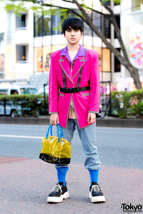 16-year-old Japanese student Taira on the street in Harajuku wearing a black harness over a vintage 