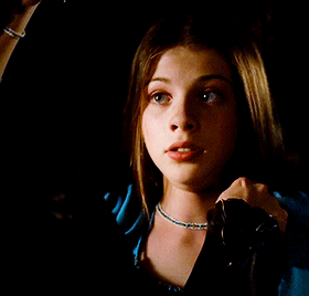 [GIF description: a GIFset from Buffy the Vampire Slayer. Dawn is chained up in front of a sneering 