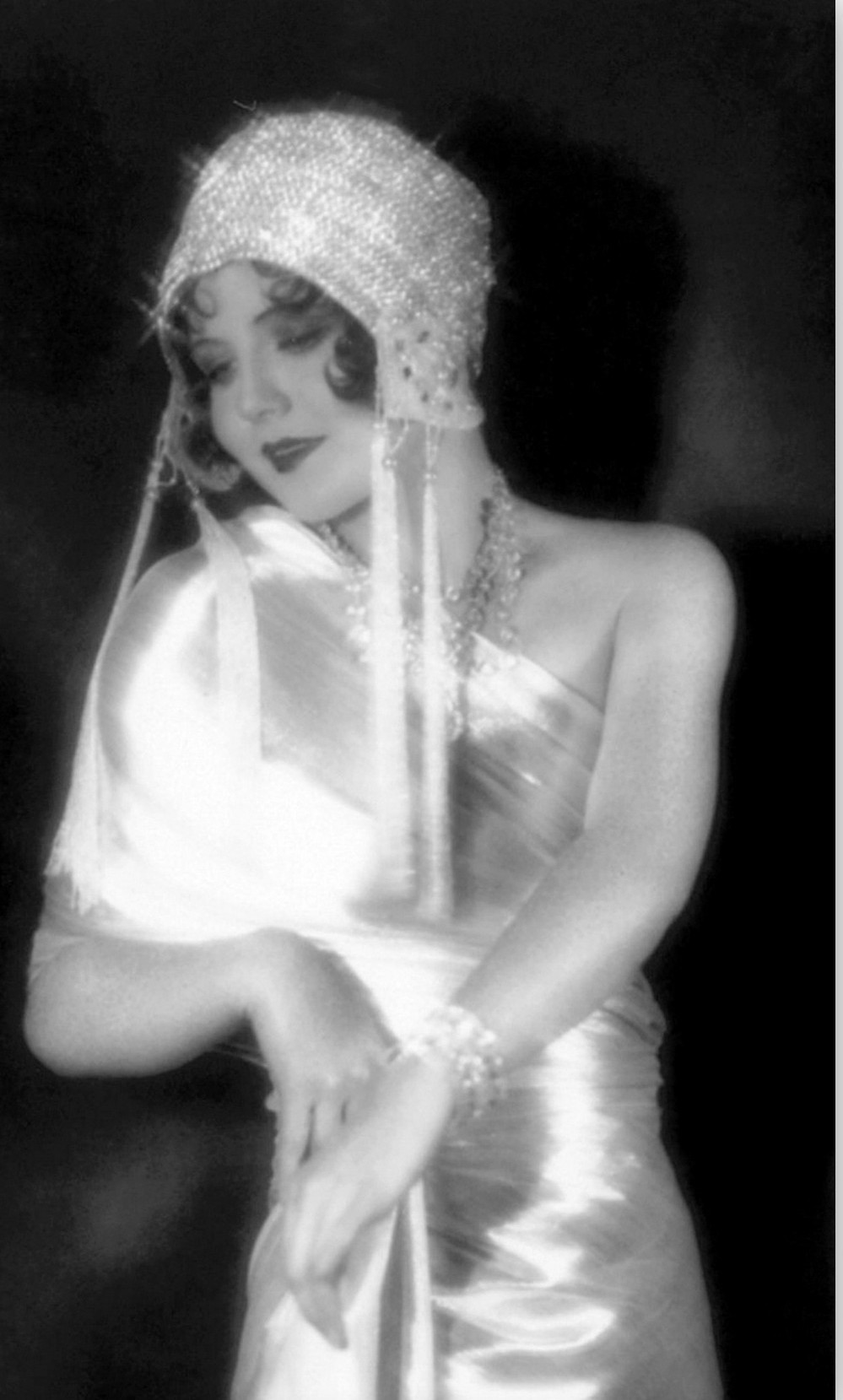 thewisecrackingtwenties: Stunning Nancy Carroll wearing a gorgeous satin gown in The