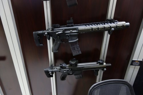 45-9mm-5-56mm:  awesomeness2:  thedepthcharger:  Sig Sauer MCX. It is operated by a dual short stroke piston gas tappet system with the recoil spring assembly in the upper, so no buffer tube is needed. There will be an integral suppressor available,