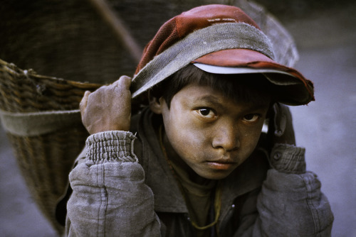 autremondeimagination:  Stolen Childhoods by Steve McCurry From Top: Africa, Tibet, Nepal, Kabul, Myanmar/ Burma, Afghanistan, Bangladesh, India, Burma, Niger 