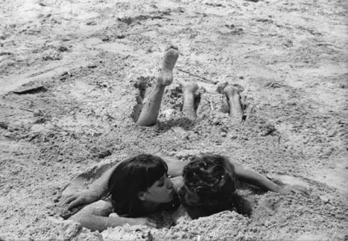 hauntedbystorytelling:    Anna Karina and Jean Paul Belmondo in ‘Pierrot le fou’, directed by Jean-Luc Godard, 1966 