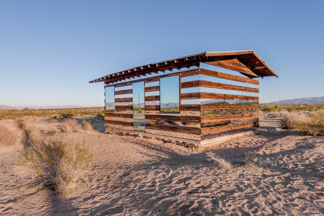 dezeen:  Lucid Stead installation by Phillip K Smith III makes a desert cabin appear