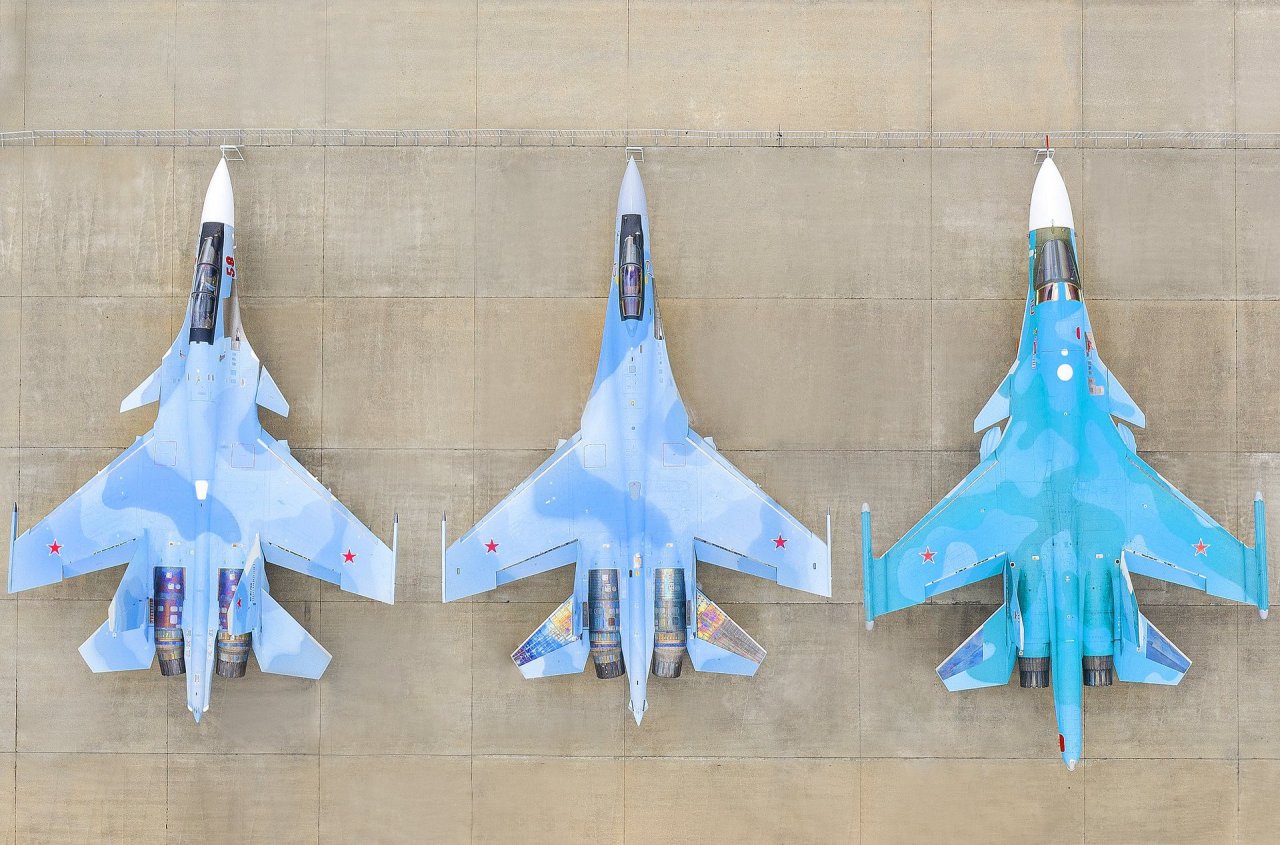 planesawesome:The Su-30SM, Su-35S and Su-34 lined up at apron