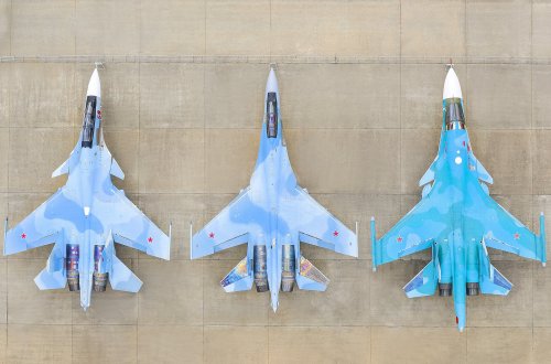 planesawesome:The Su-30SM, Su-35S and Su-34 lined up at apron