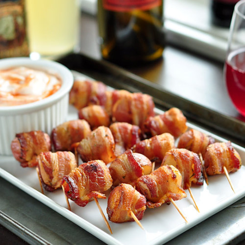 Bacon-Wrapped Potato Bites with Spicy Sour Cream Dipping SauceMakes about three dozen bites 1 poun