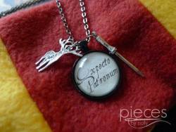 wickedclothes:  Expecto Patronum Necklace Dementors won’t dare step near you with this charm around your neck. Includes optional Hogwarts acceptance letter and your choice of animal charm to match your patronus. Sold on Etsy.