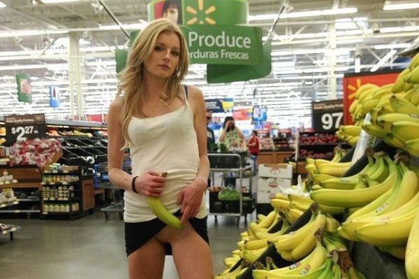 flashinginstores:  I think this naughty pussy flashing girl is showing us where she