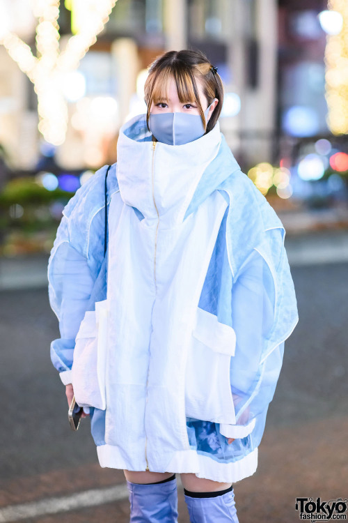 Japanese graphic designer Nene on the street in Harajuku wearing an oversized jacket by Japanese fas