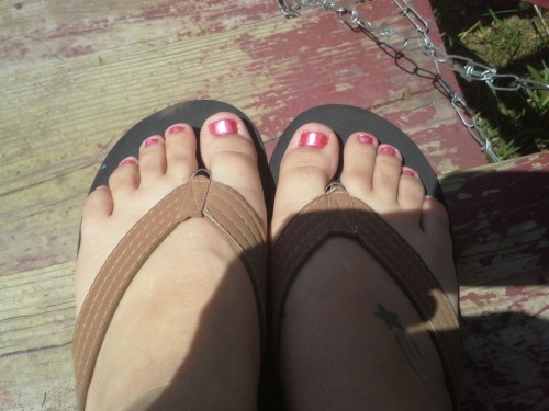 octopuslips:  My pretty toes all done with my thong flops. Hope my toes are sexy enough.