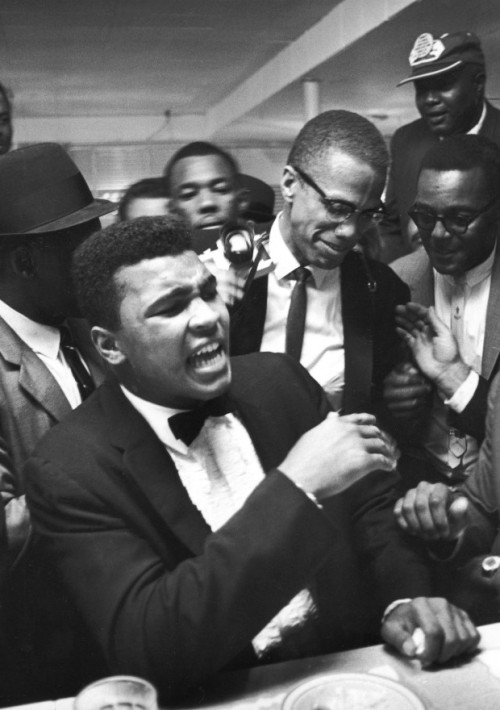 twixnmix: Muhammad Ali celebrating with Malcolm X at the Hampton House in Miami after he won the Wor