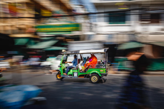 “What’s the most Thai scene you can imagine?”I offer you a Buddhist monk in the back of a speeding...