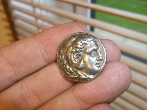 thediaryofadisappointingman:A silver Tetradrachm (four Drachma) coin of Alexander the Great, with mi