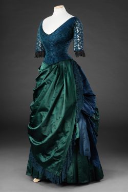 lookingbackatfashionhistory:• Dress.Date: ca. 1886-1887Medium: Silk and lace, trimmed with lace.